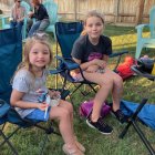 Lemoore youngsters Lila and Eloise Walker enjoying the atmosphere of the Sarah Mooney Museum and of course their ice cream.